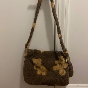Brown teddy over the shoulder bag